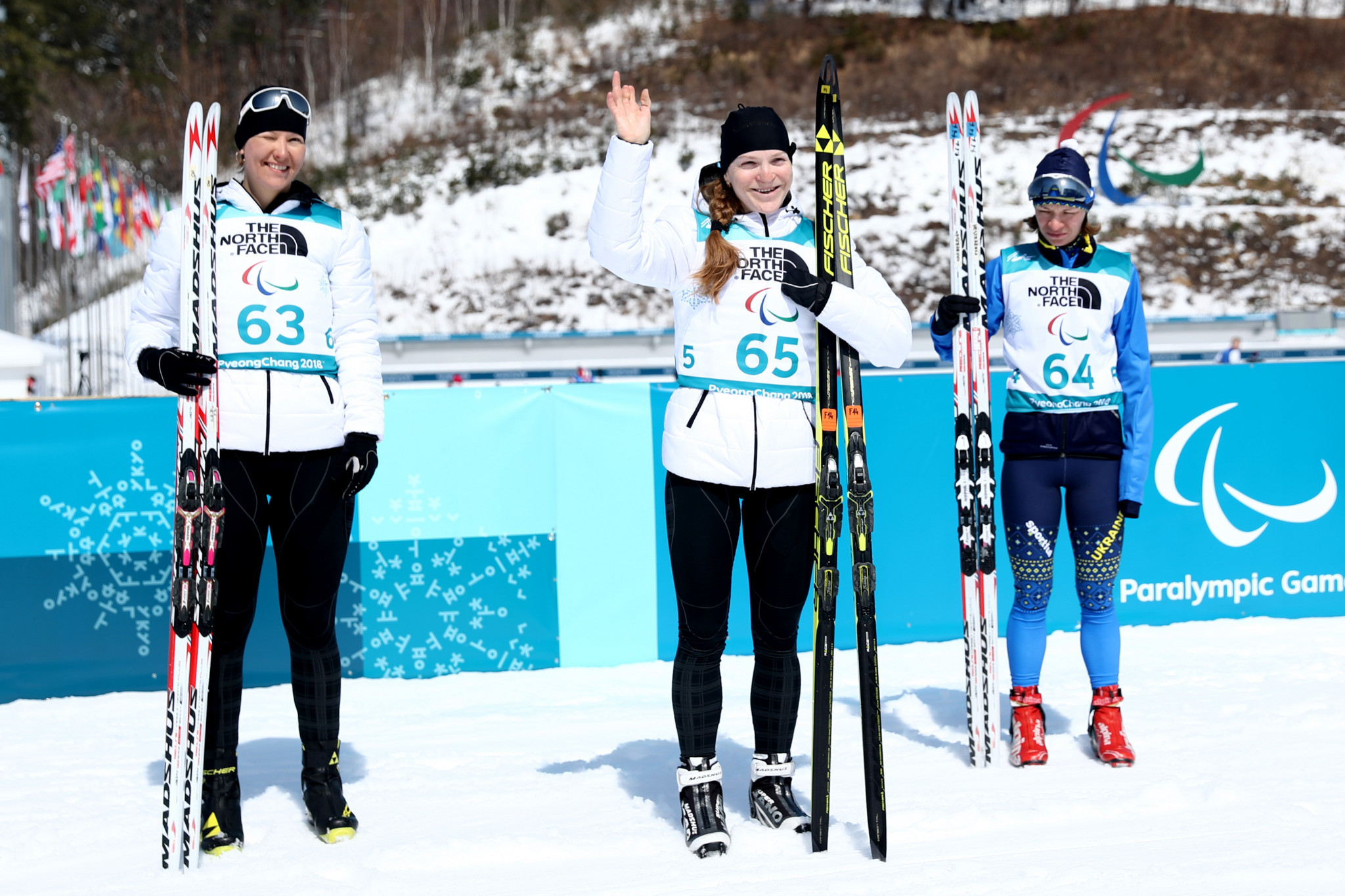 Russia's Ekaterina Rumyantseva, middle, and Anna Milenina, left, secured a Neutral Paralympic Athletes one-two in the women's 6km standing event at Pyeongchang 2018 ©Getty Images