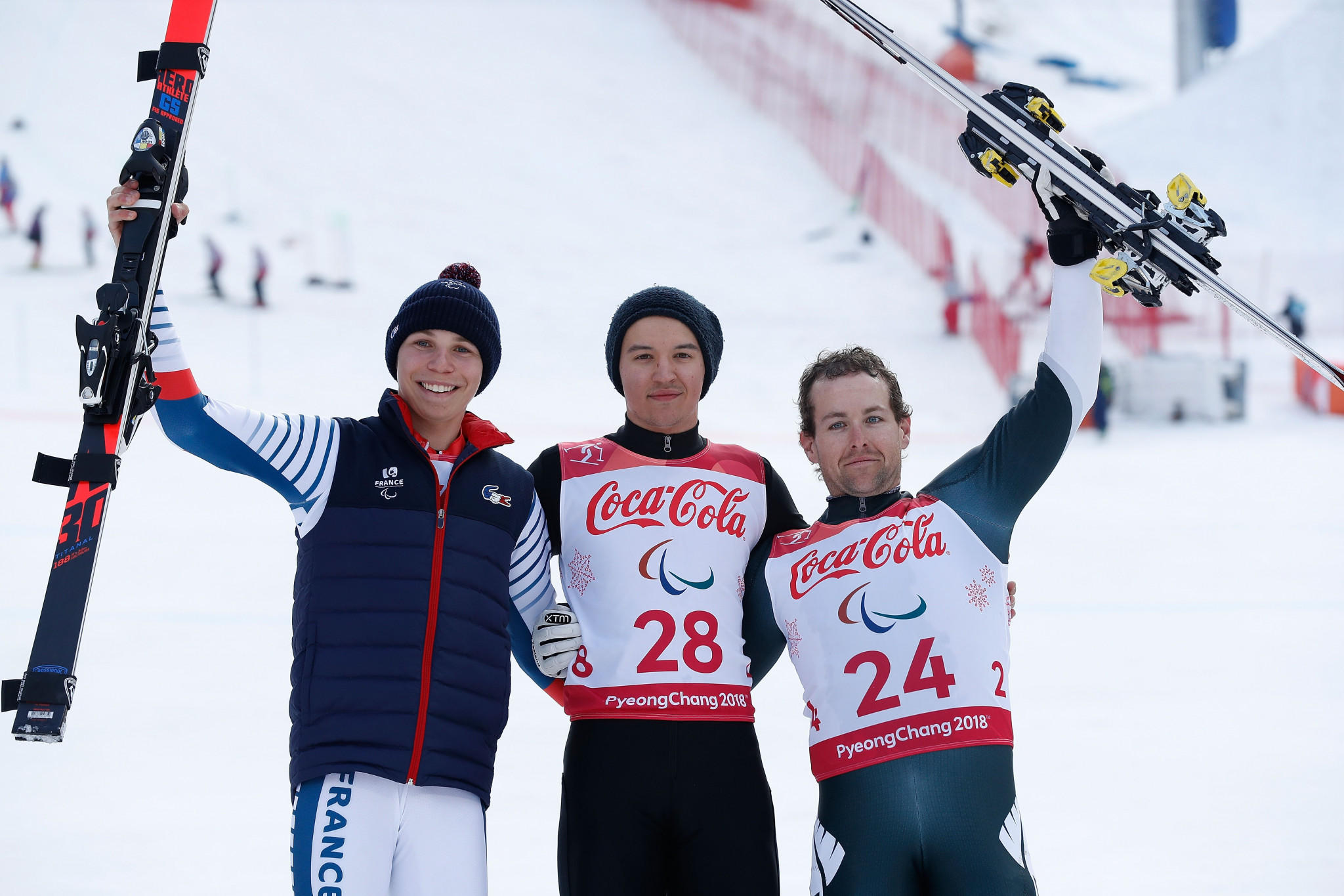 Neutral Paralympic Athlete Aleksei Bugaev, centre, retained his men's super combined standing title ©Getty Images