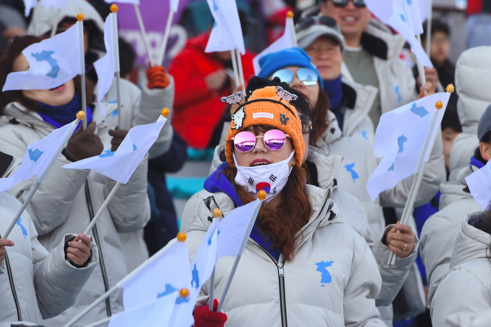 South Korean supporters wave unification flags at the Alpensia Biathlon Centre ©Getty Images