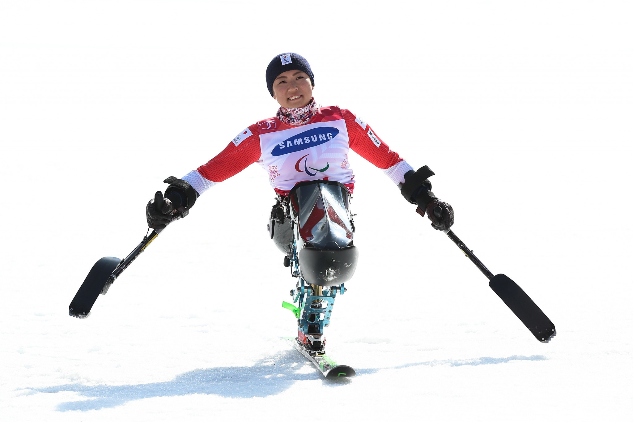 Japan's Momoka Muraoka celebrates after winning her country's first gold medal at the Games in the women's giant slalom sitting at the Jeongseon Alpine Centre ©Getty Images