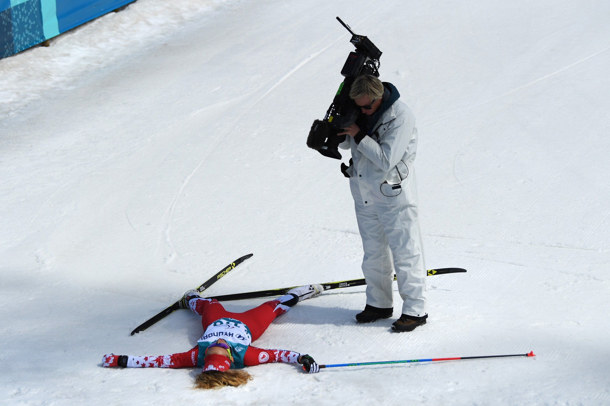Seventeen-year-old Natalie Wilkie of Canada collapsed in exhaustion after coming out on top in the women’s 7.5km standing competition ©Getty Images
