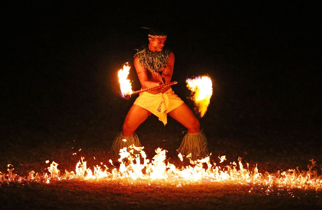 The fire performers had the crowd in awe as they lit up the field of play at Apia Park ©Getty Images