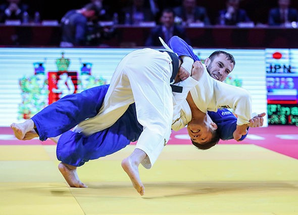 Hifumi Abe, in white, won in the men's under-66kg division ©IJF