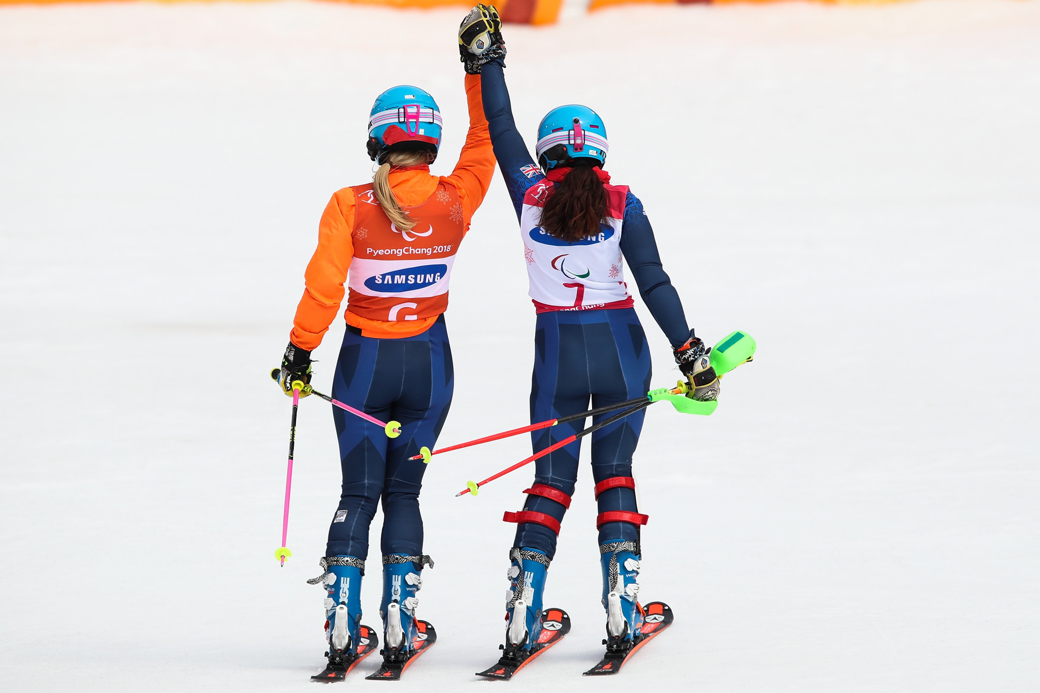 Britain's Menna Fitzpatrick and guide Jennifer Kehoe celebrate their victory in the women's visually impaired slalom at the Jeongseon Alpine Centre ©Getty Images