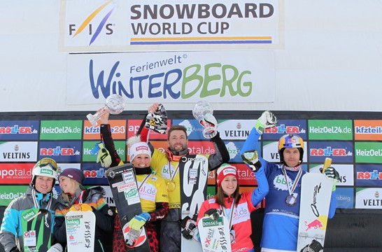 Austria's Claudia Riegler and Andreas Prommegger celebrate overall World Cup victory in the Parallel Snowboard Cross ©FIS