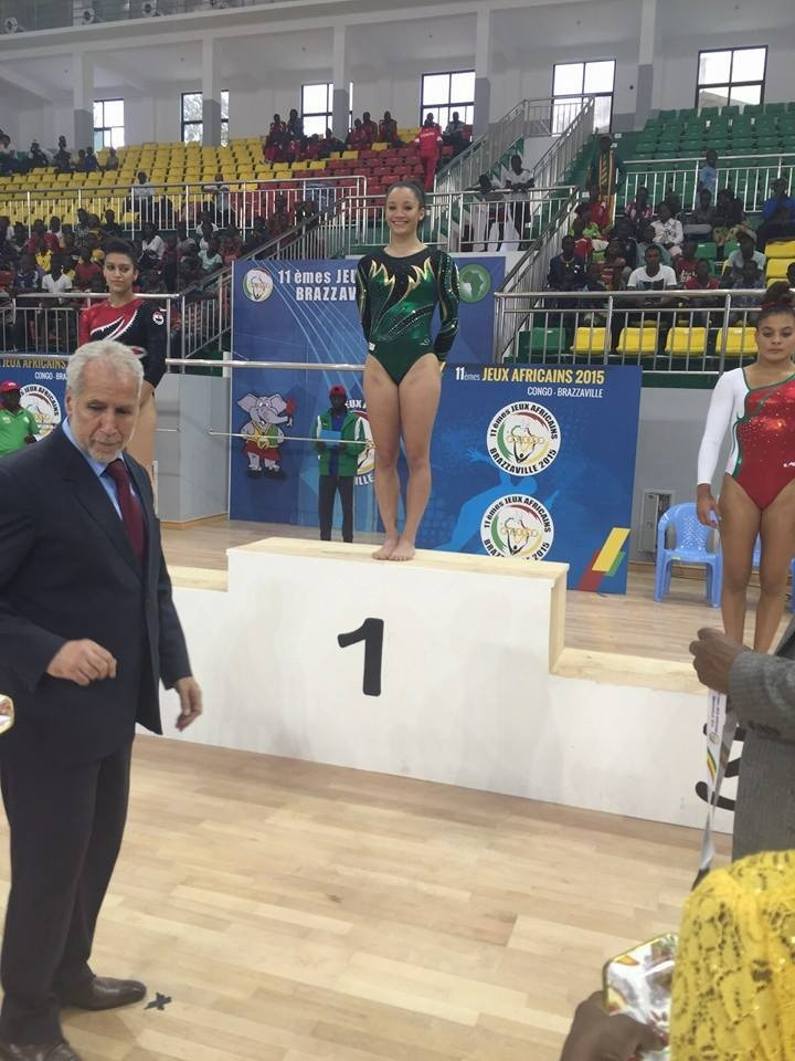 Kirsten Backett is awarded her all-around gymnastics gold medal at the All-African Games ©SAGymnastics