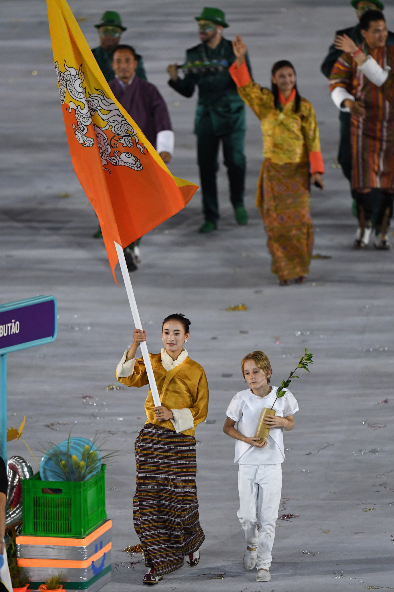 Karma Karma carries the Bhutan flag at Rio 2016 ©Getty Images
