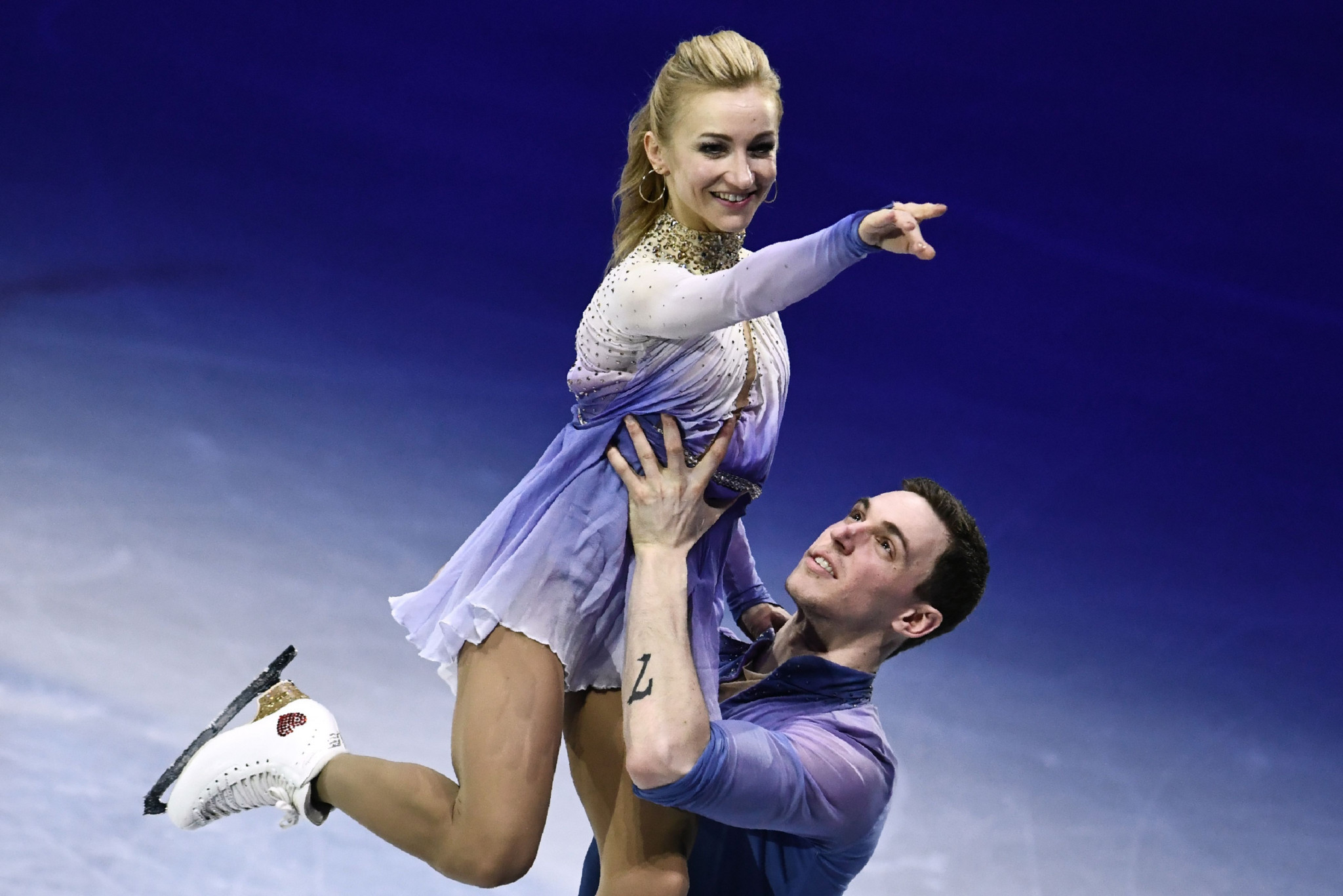 Olympic pairs champions add World Figure Skating Championships gold