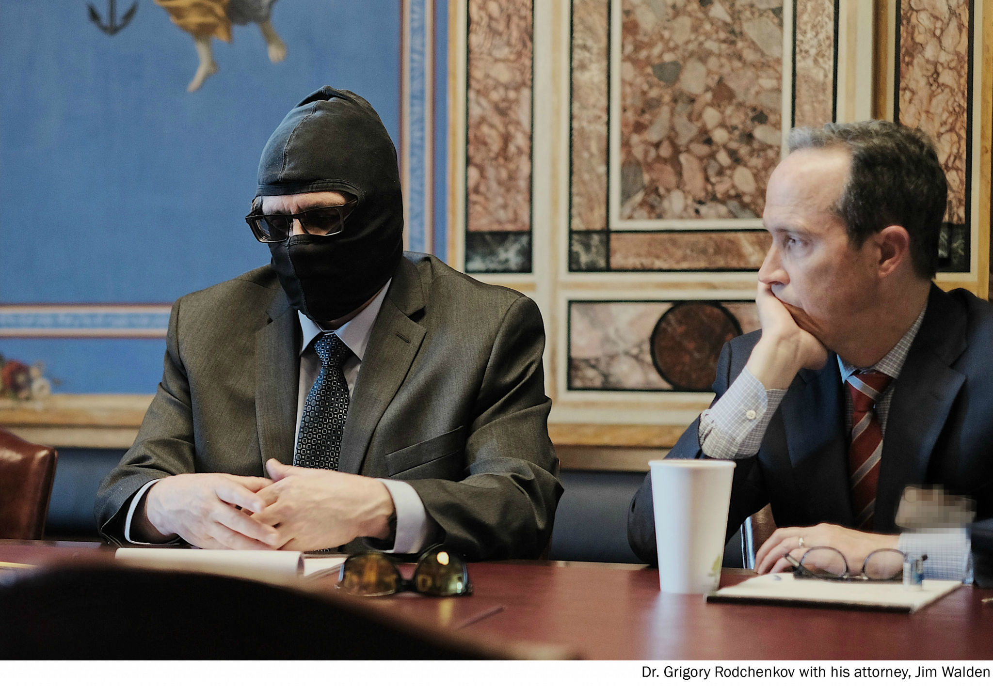 Grigory Rodchenkov wore a mask to hide his identity at the meeting ©Helsinki Commission