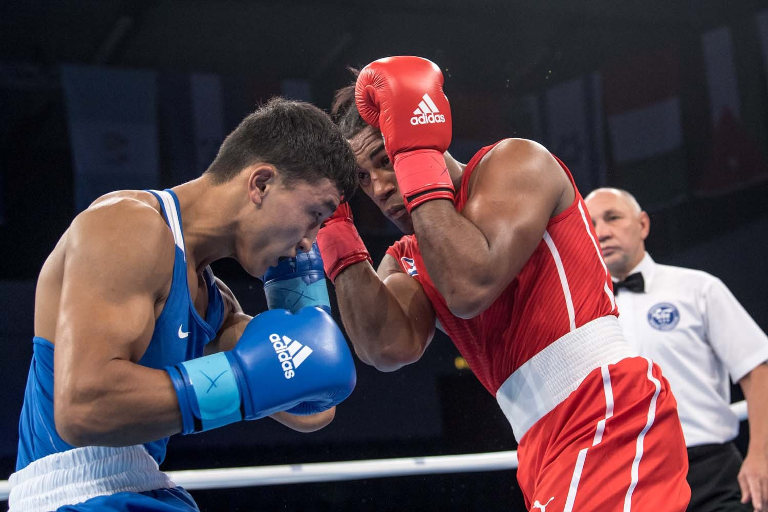 Kazakhstan's Abilkhan Amankul, left, pictured in action at last year's World Championships, was among the winners today for the Kazakhstan team ©AIBA