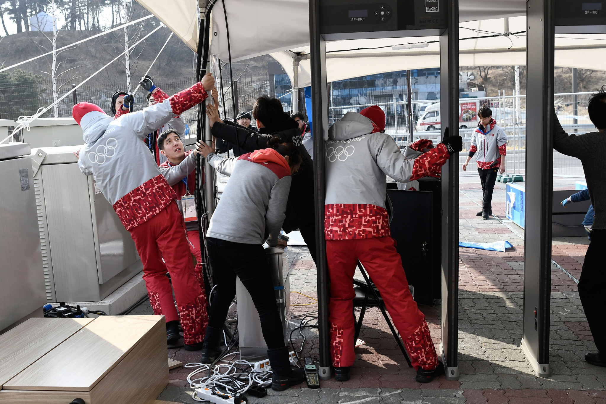 Volunteers, like those seen here at Pyeongchang 2018, are seen as vital to the success of any Olympic Games ©Getty Images