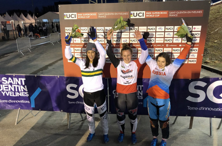 Laura Smulders of The Netherlands, centre, was the winner of the first elite women's race in the UCI BMX Supercross World Cup series which got underway near Paris ©Twitter