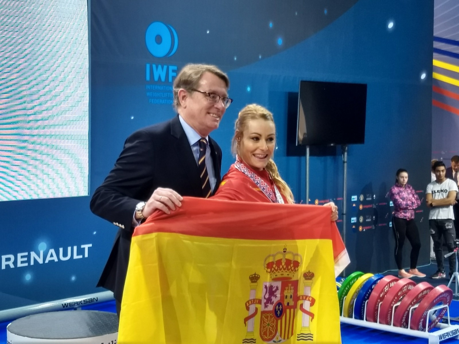 Lydia Valentin celebrates with Spain's Ambassador to Romania after her latest victory in the European Championships ©Brian Oliver/ITG