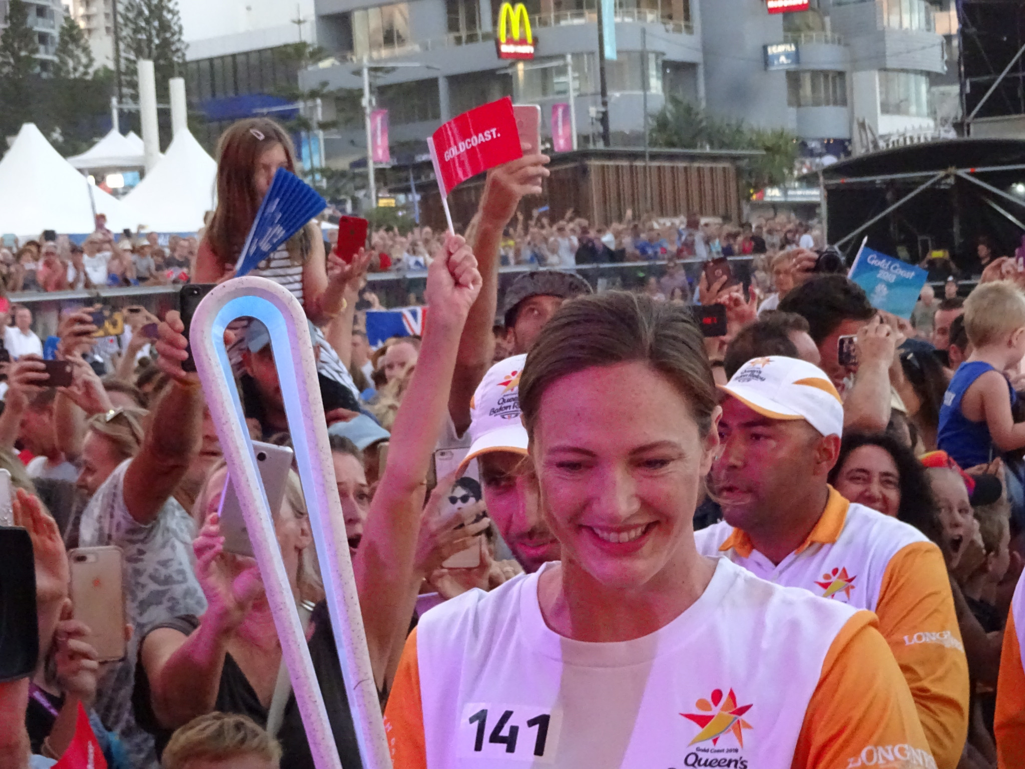 Swimmer Cate Campbell carries the Gold Coast 2018 Baton ©ITG