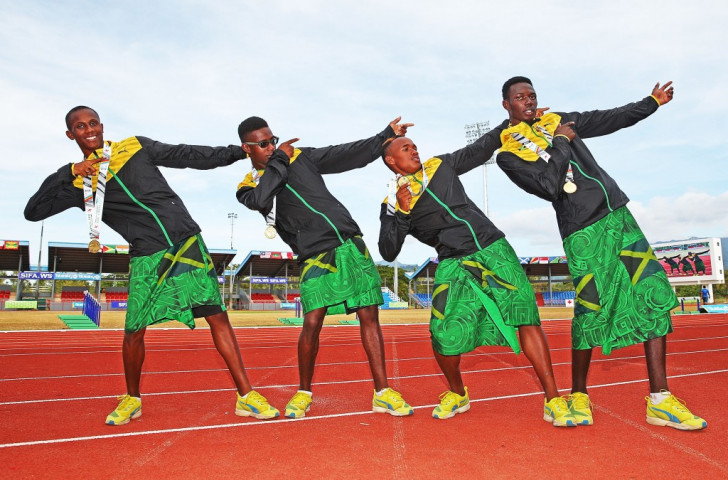 The Jamaican 4x400m relay team give their best impression of Jamaican sprint king Usain Bolt ©Getty Images