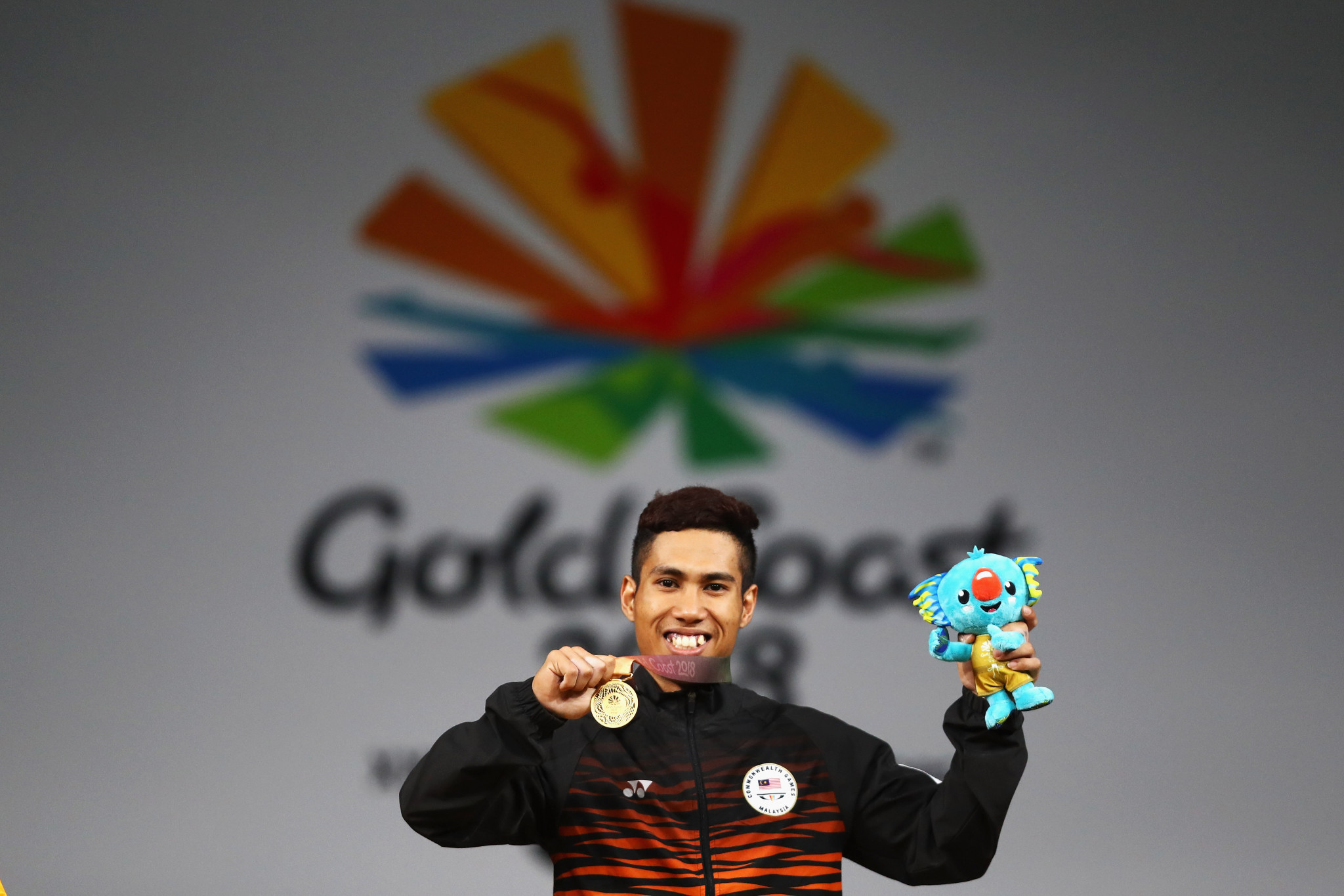 Muhamad Aznil Bidin of Malaysia celebrates his men's 62kg triumph ©Getty Images