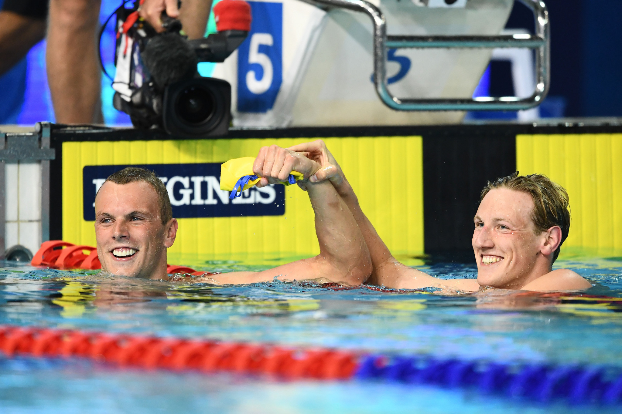 Australia's Kyle Chalmers, left, celebrates with Mack Horton after winning the 200m freestyle ©Getty Images