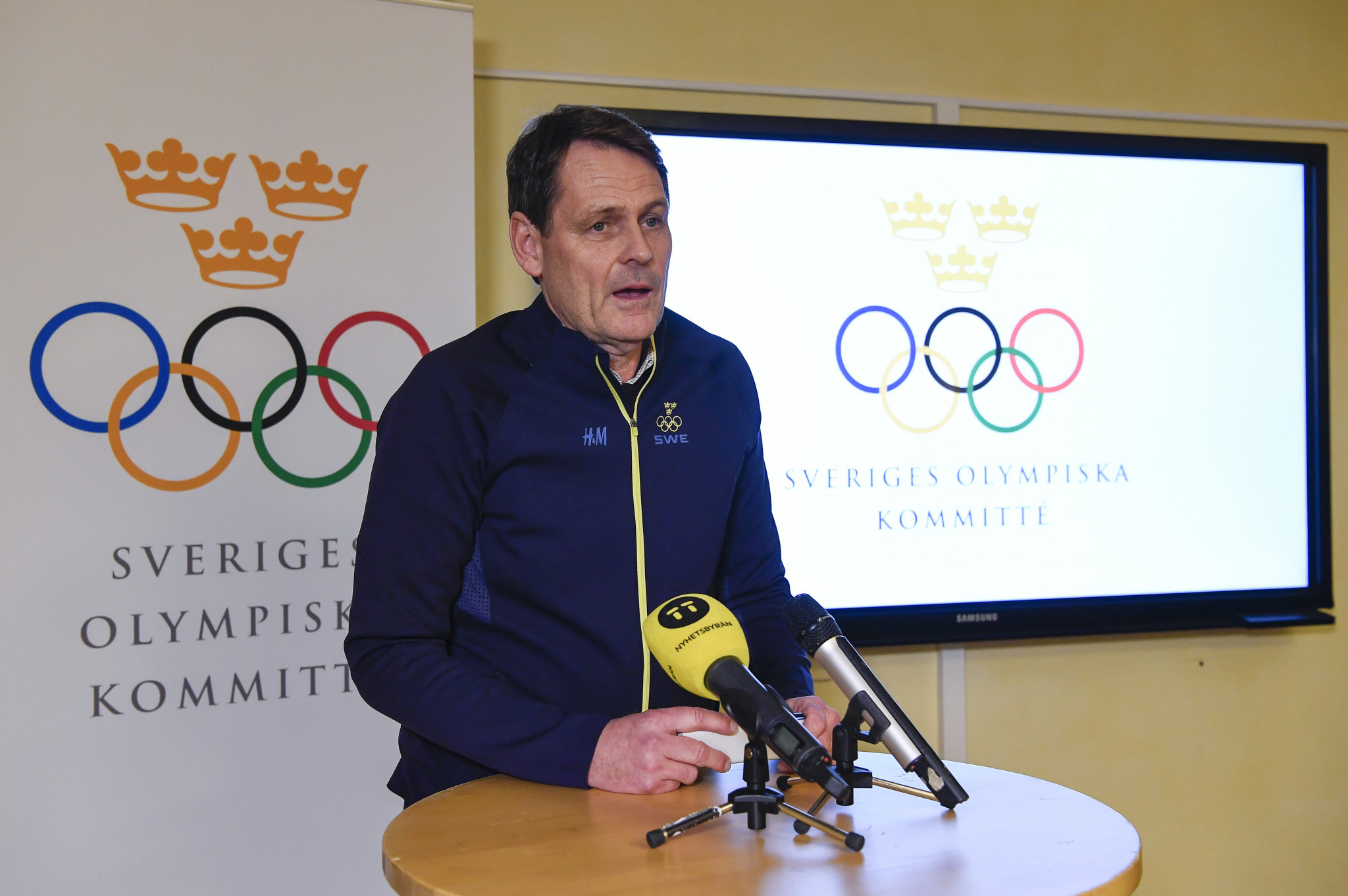 Swedish Olympic Committee chief executive, Peter Reinebo pictured speaking about the potential Stockholm 2026 bid, has risked an IOC warning after speaking about rival contenders ©Getty Images