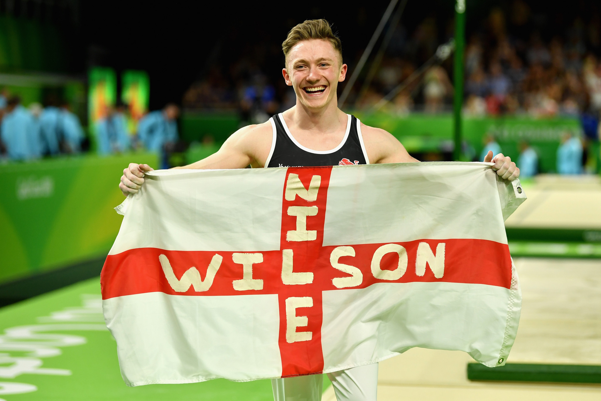 England's Nile Wilson dazzled his way to the men's all-around gymnastics title as he produced a stunning horizontal bar routine to edge compatriot James Hall ©Getty Images