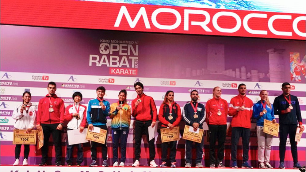 The winners from the Karate 1-Premier League event at the Prince Moulay Abdellah Sports Hall in Rabat line up with their prizes and awards after the event ©WKF