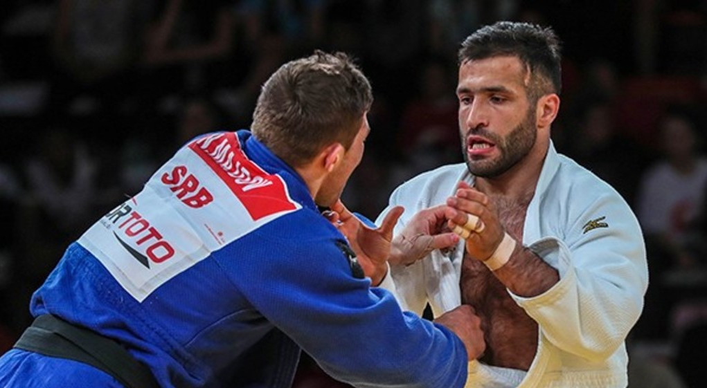Komronshokh Ustopiriyon of Tajikistan, right, earned the gold medal in the men's under 90kg category in Antalya against Serbia's world champion Nemanja Madjov ©IJF