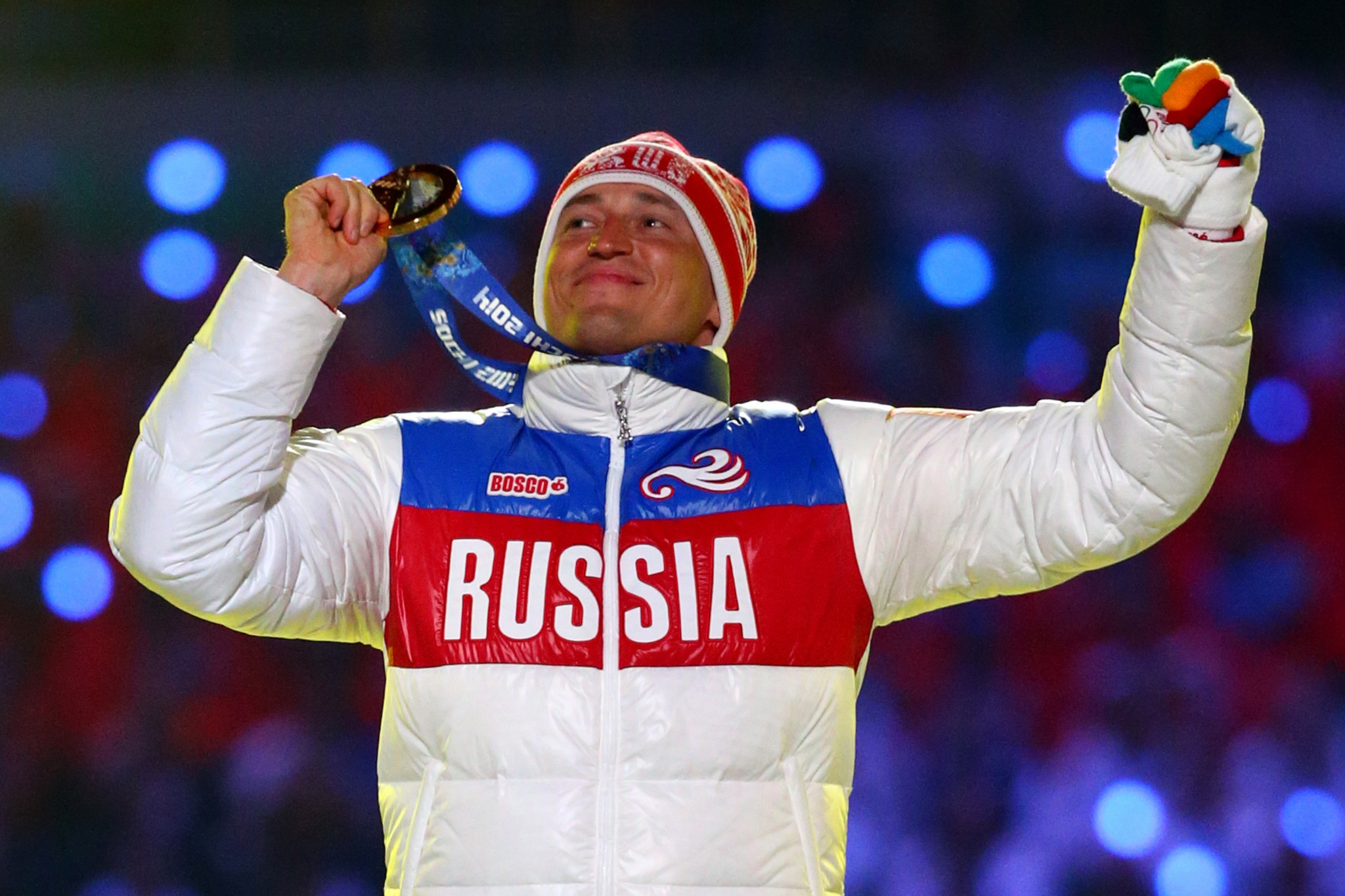 Alexander Legkov celebrates Olympic gold at Sochi 2014, a medal which was taken from him before being reinstated ©Getty Images