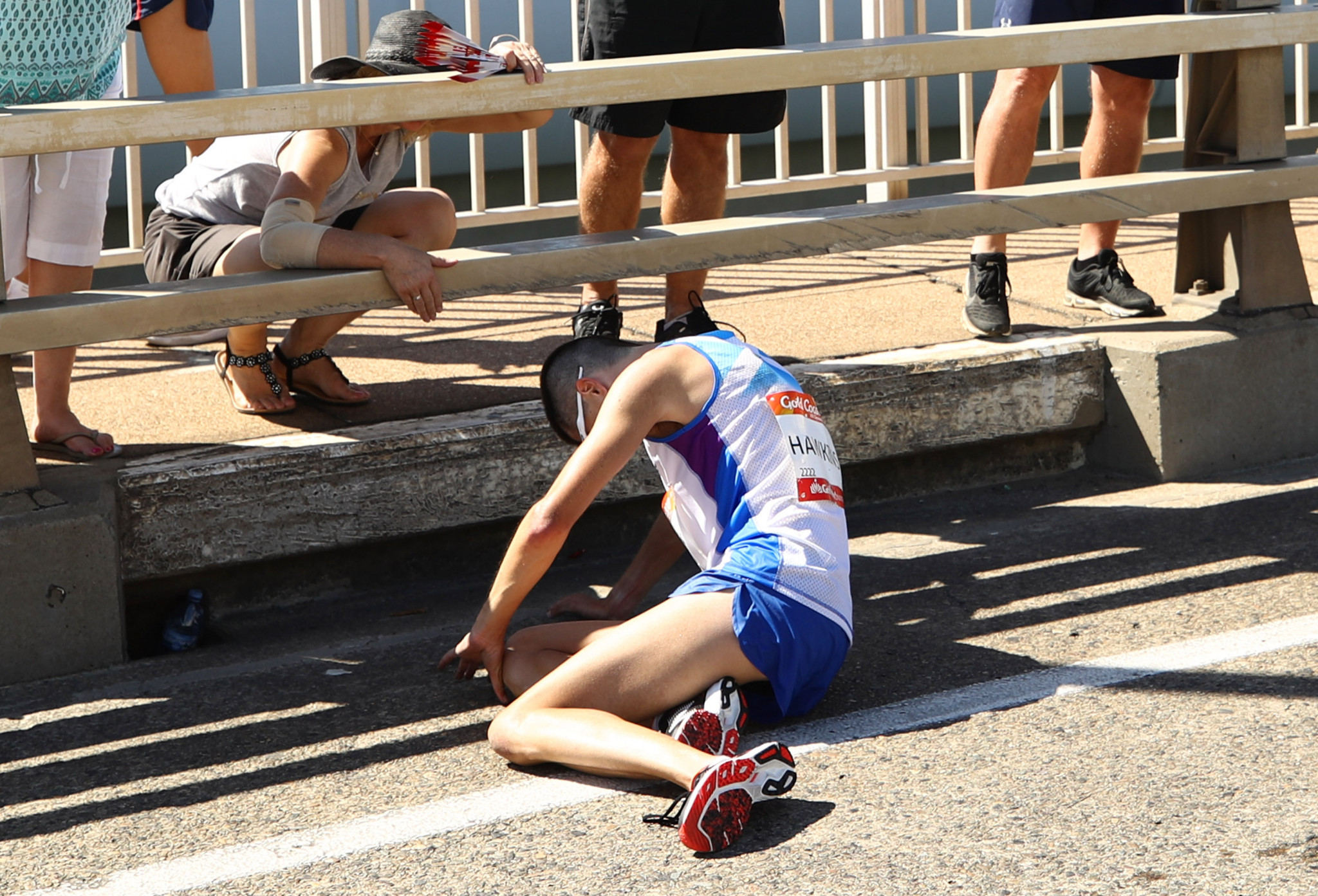 Disaster struck for Scotland's Callum Hawkins in the men's marathon when he collapsed in exhaustion in the closing stages in one of the most dramatic moments of Gold Coast 2018 ©Getty Images