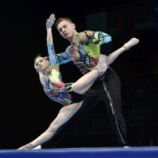 Russia's Marina Chernova celebrated a record third consecutive mixed pair gold medal ©FIG
