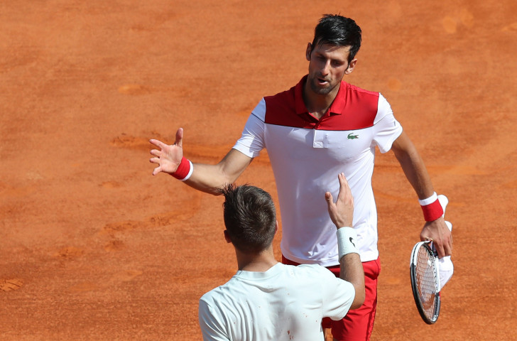 Serbia's former world number one Novak Djokovic shakes hands with Croatia's Borna Ćorić after reaching the third round of the Monte Carlo Masters as he continued his comeback from injury ©Getty Images