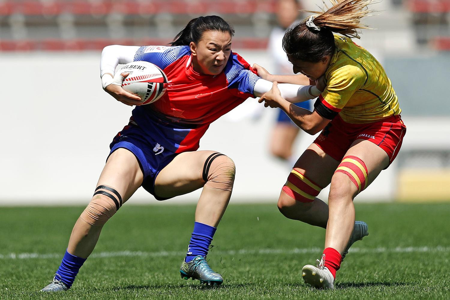 China and Spain both reached the last eight on a day of surprises ©World Rugby