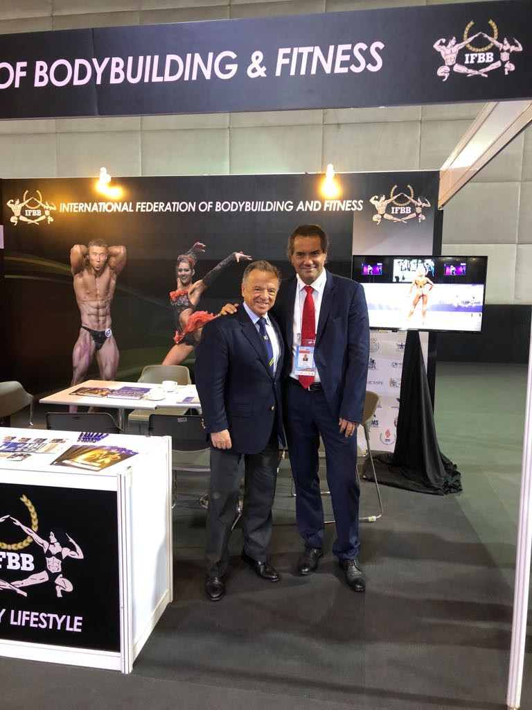 Rafael Santonja, left, and PASO President Neven Ilic, right, discussed bodybuilding's inclusion on the Pan American Games programme at Lima next year ©IFBB