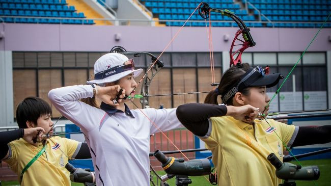 South Korea's Choi Bomin, centre, finished top of the women's compound qualification rankings ©World Archery