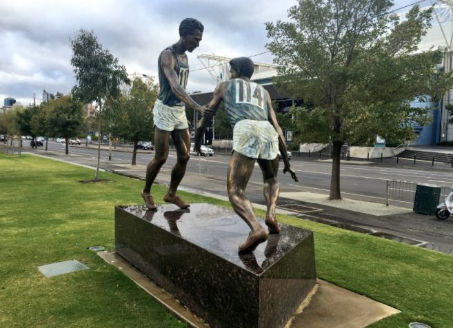 John Landy's action in turning back to help Ron Clarke back to his feet in their 1956 mile race is commemorated in a sculpture that sits in Melbourne's Olympic Park ©Twitter