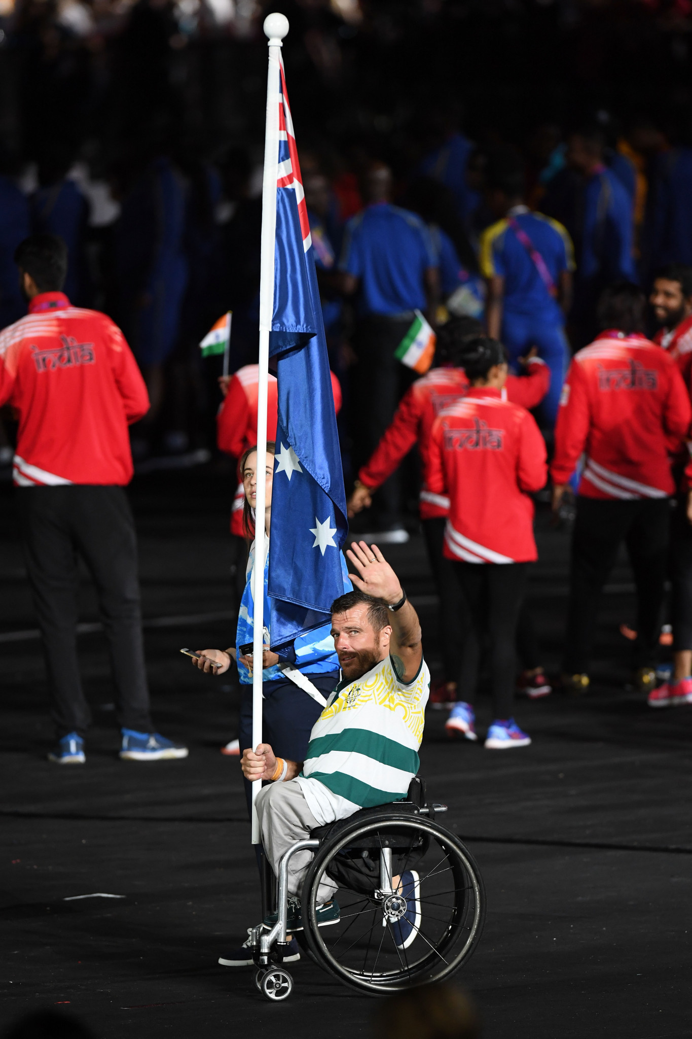 Kurt Fearnley was given the honour of carrying Australia's flag during the Closing Ceremony of the Gold Coast 2018 Commonwealth Games ©Getty Images