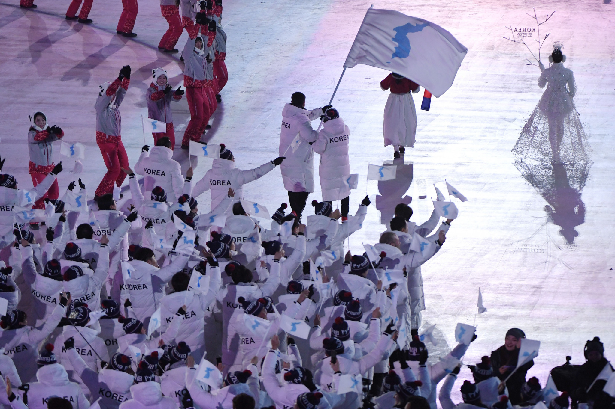 North and South Korea athletes pictured marching together under the unified flag at the Opening Ceremony of Pyeongchang 2018 ©Getty Images