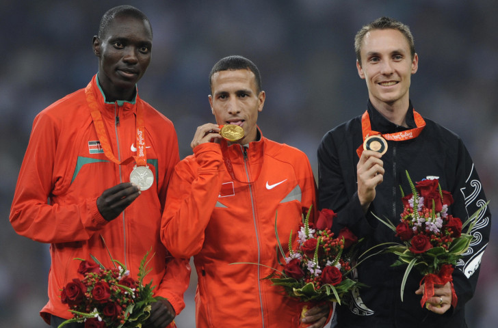 Asbel Kiprop, pictured left on the Beijng 2008 Olympic podium, moved up to gold when Rashid Ramzi of Bahrain was subsequently disqualified for doping - but he is now reported to be facing doping charges himself ©Getty Images