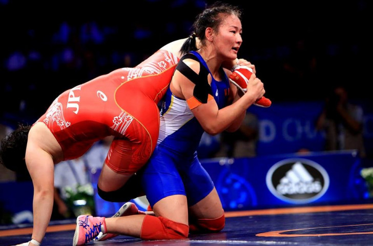 Sara Dosho claimed a third medal of the day for Japan with bronze at 69kg ©Martin Gabor/UWW