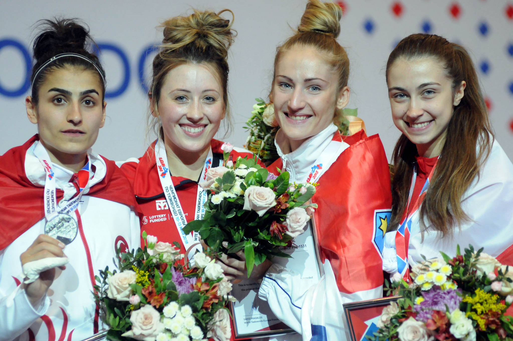Jade Jones, second from left, has successfully defended her women’s under-57 kilograms title after coming out on top at the European Taekwondo Championships in Kazan ©World Taekwondo Europe/Murat Tarhan