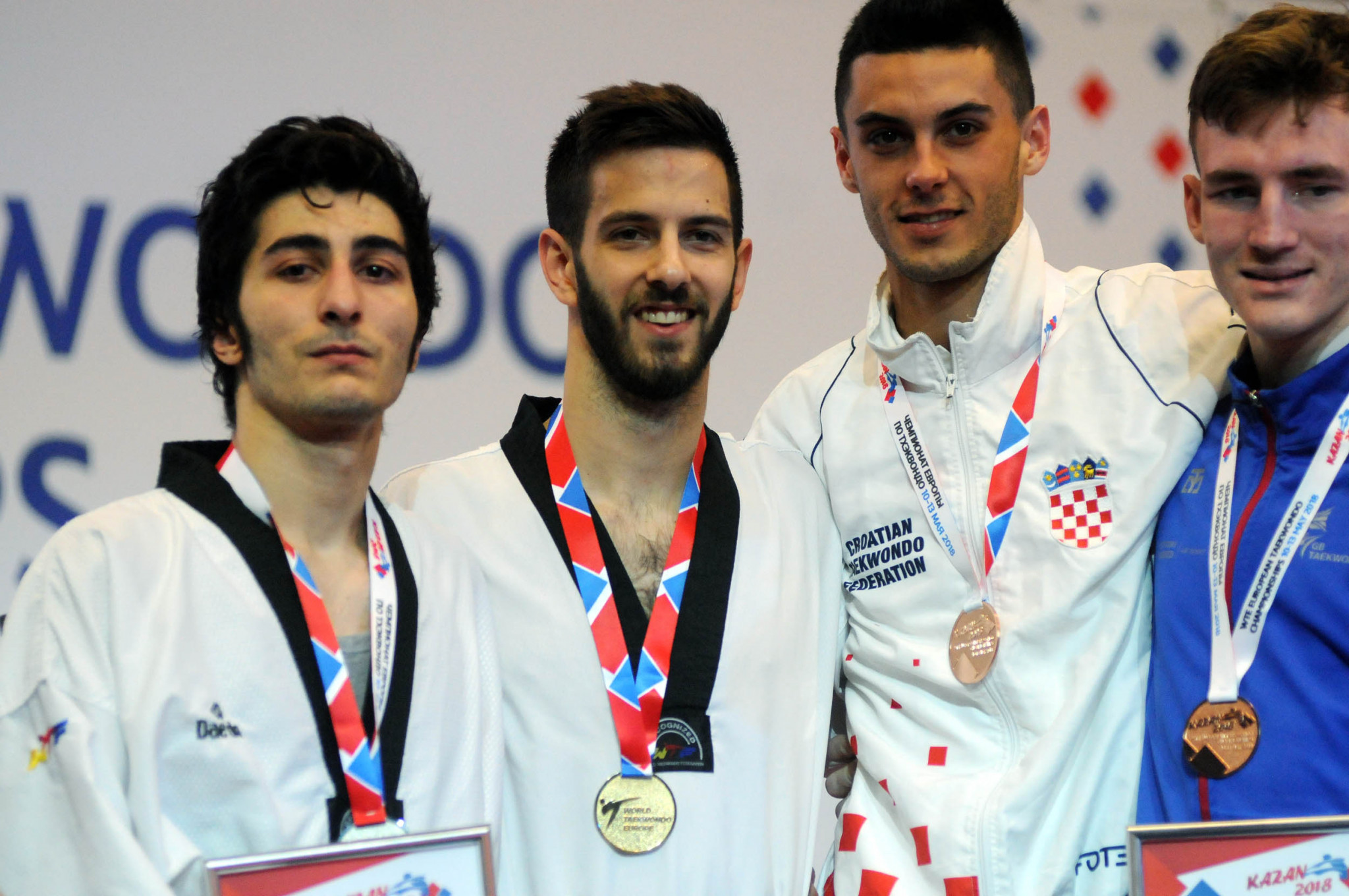 Croatia's Lovre Brecic, second from left, won the men's under-63kg gold medal ©World Taekwondo Europe/Murat Tahran