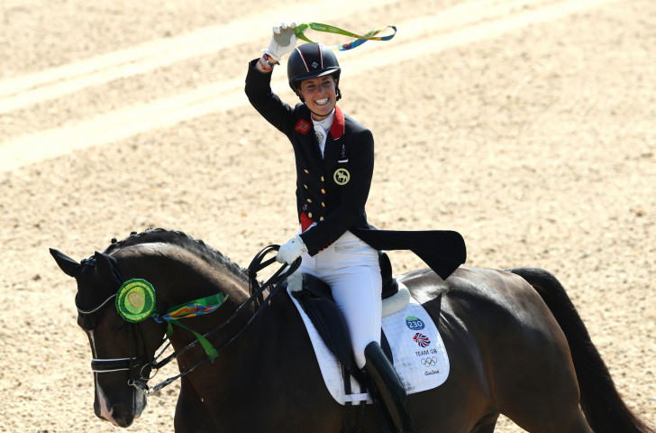 Britain's Charlotte Dujardin, pictured celebrating the successful defence of her Olympic individual dressage title in Rio, has consistently beaten male and female opponents at the highest level of sport ©Getty Images  