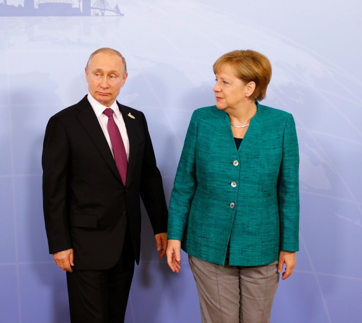 German Chancellor Angela Merkel, right, pictured alongside Russian President Vladimir Putin ©Getty Images