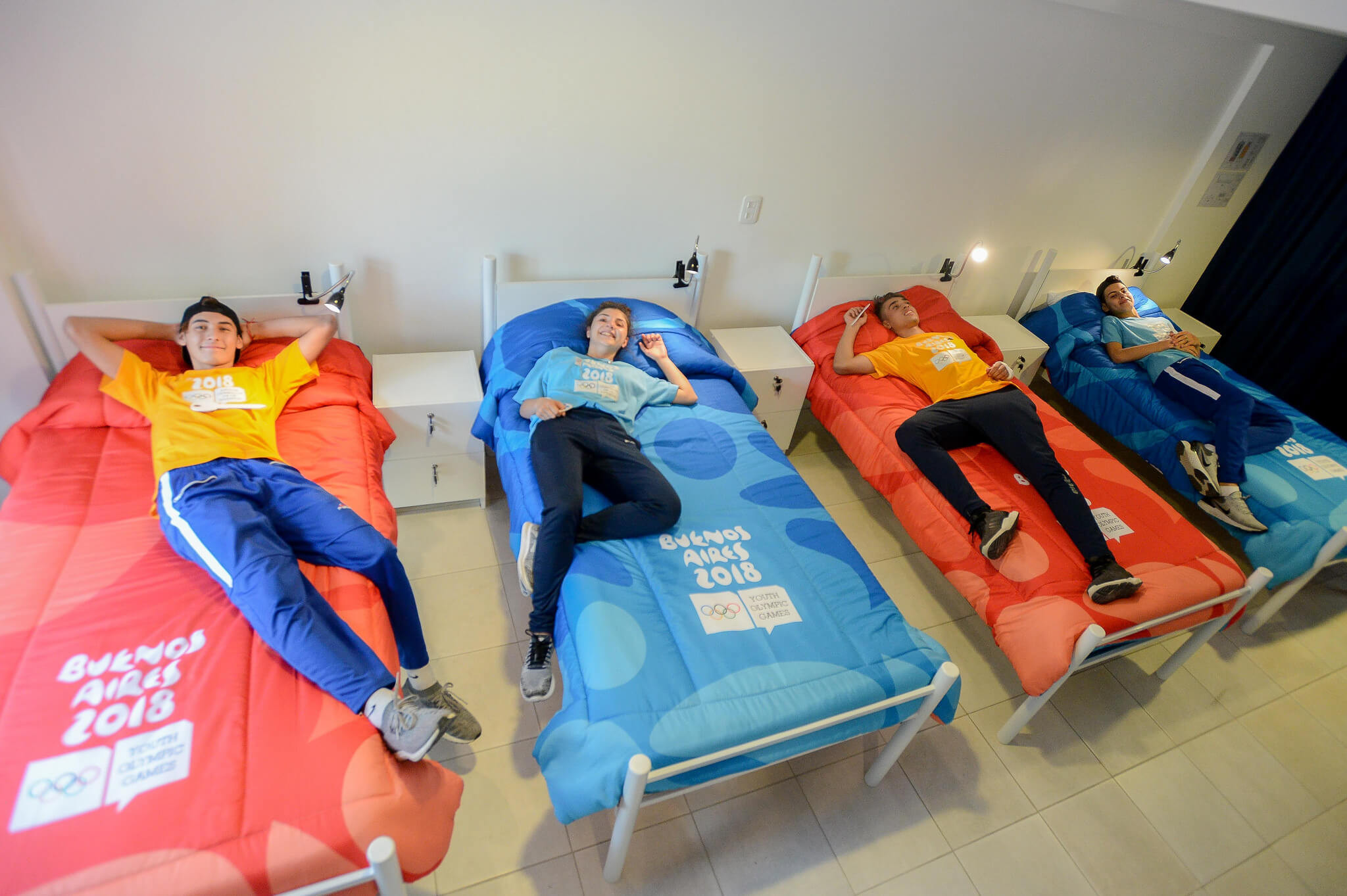Aspiring athletes test out beds in the Village ©Buenos Aires 2018
