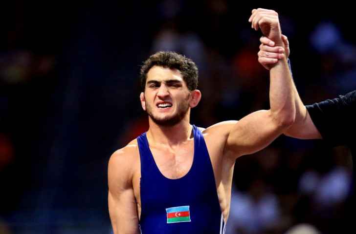 Azerbaijan’s Haji Aliyev retained his men's freestyle 61kg title ©Martin Gabor/UWW