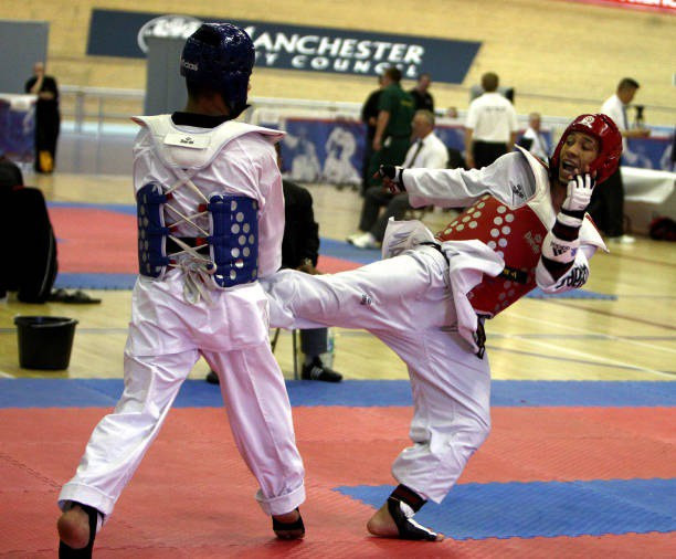 Jordan Gayle, right, follows other athletes into the GB Taekwondo coaching set-up ©GB Taekwondo 