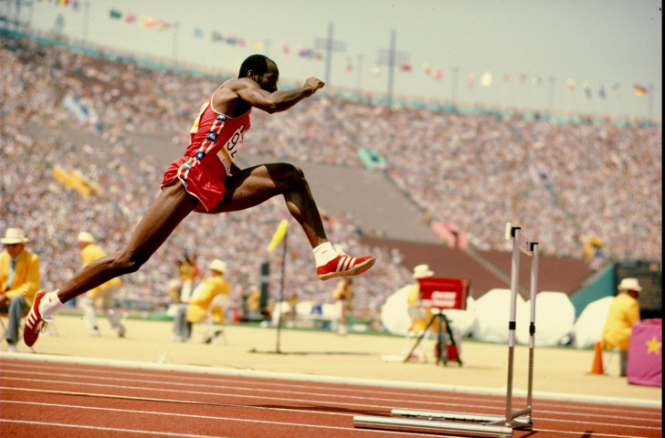 America;s Ed Moses en route to the 1984 Olympic 400m hurdles gold medal, and in the middle of a nigh-on 10-year unbeaten streak that saw him finishing first in 122 successive races ©Getty Images  