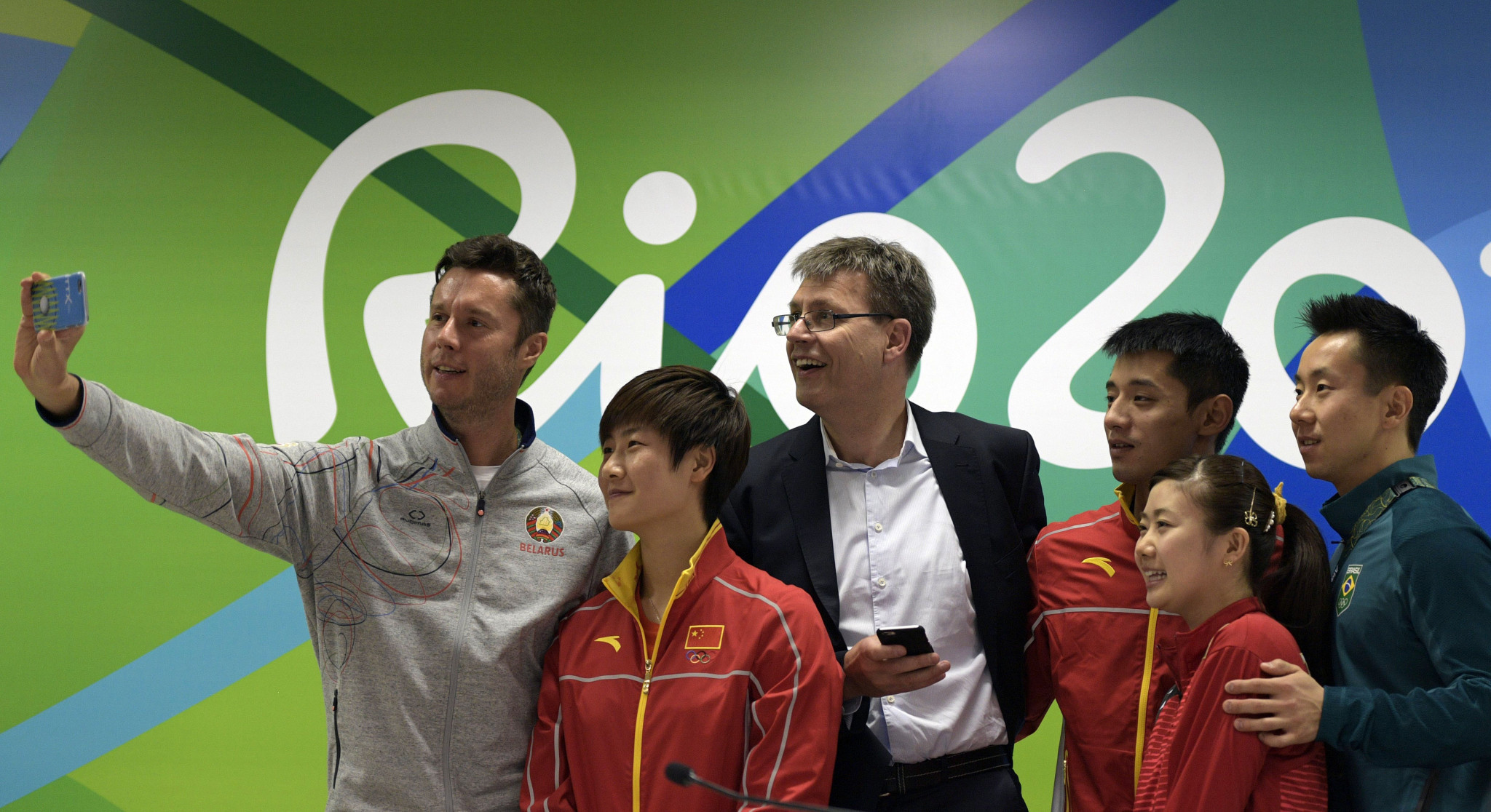Thomas Weikert, centre, poses with leading table tennis players during Rio 2016 ©Getty Images