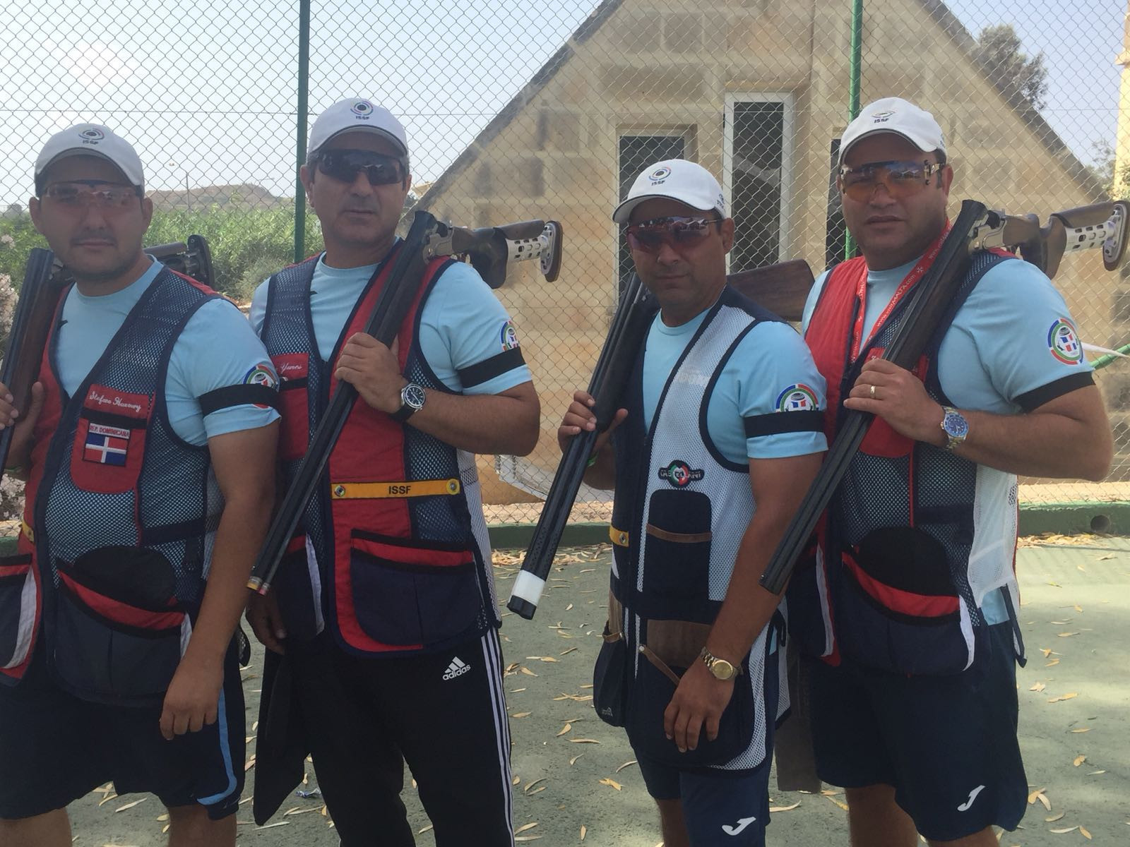Dominican Republic competitors at the ISSF Shotgun World Cup in Malta wearing black armbands in support of Italy's suspended vice president Rossi ©FITAV