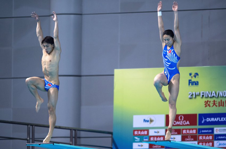 China's world champions Wang Han and  Li Zheng contributed a ninth home gold in the mixed 3m springboard synchro at their home FINA Diving World Cup in Wuhan ©FINA