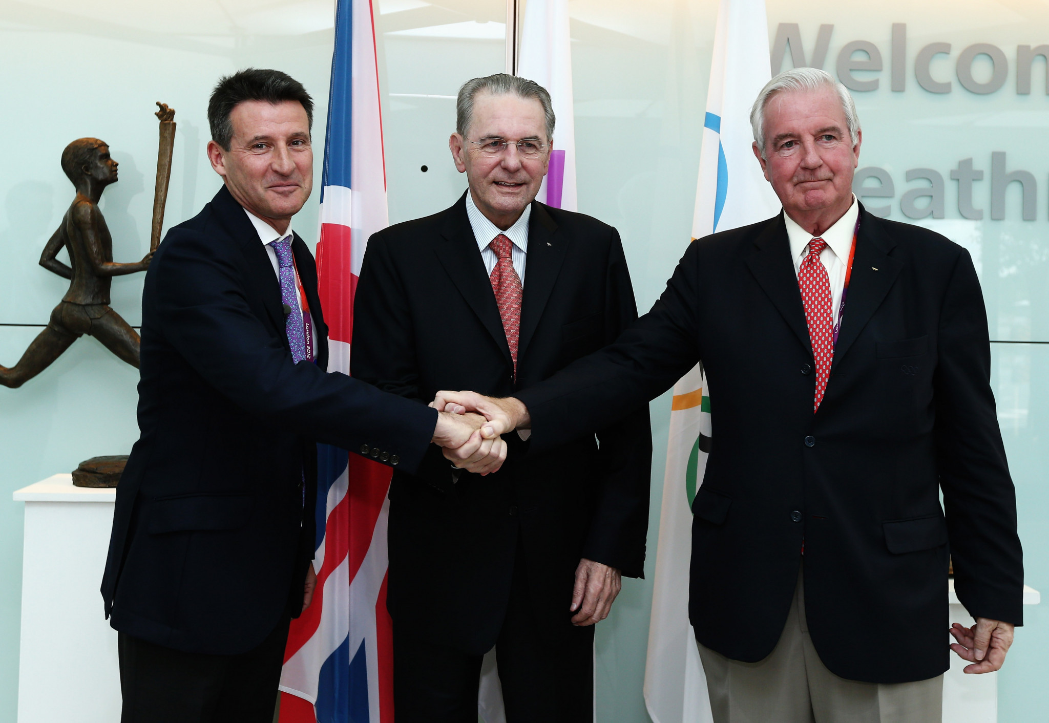 Sir Craig Reedie, right, with then-International Olympic Committee President Jacques Rogge, centre, and London 2012 chief Sebastian Coe before the British capital hosted the Olympic Games in 2012 ©Getty Images