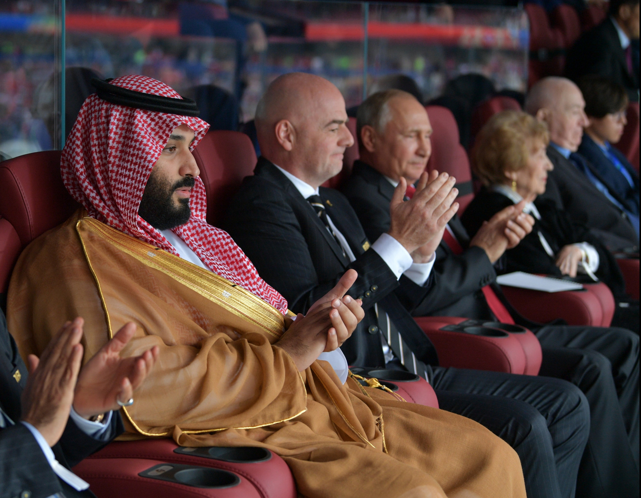 Saudi Arabian Crown Prince Mohammed bin Salman, left, alongside FIFA boss Gianni Infantino and Russian President Vladimir Putin, right, showing mixed emotions during the opening game ©Getty Images